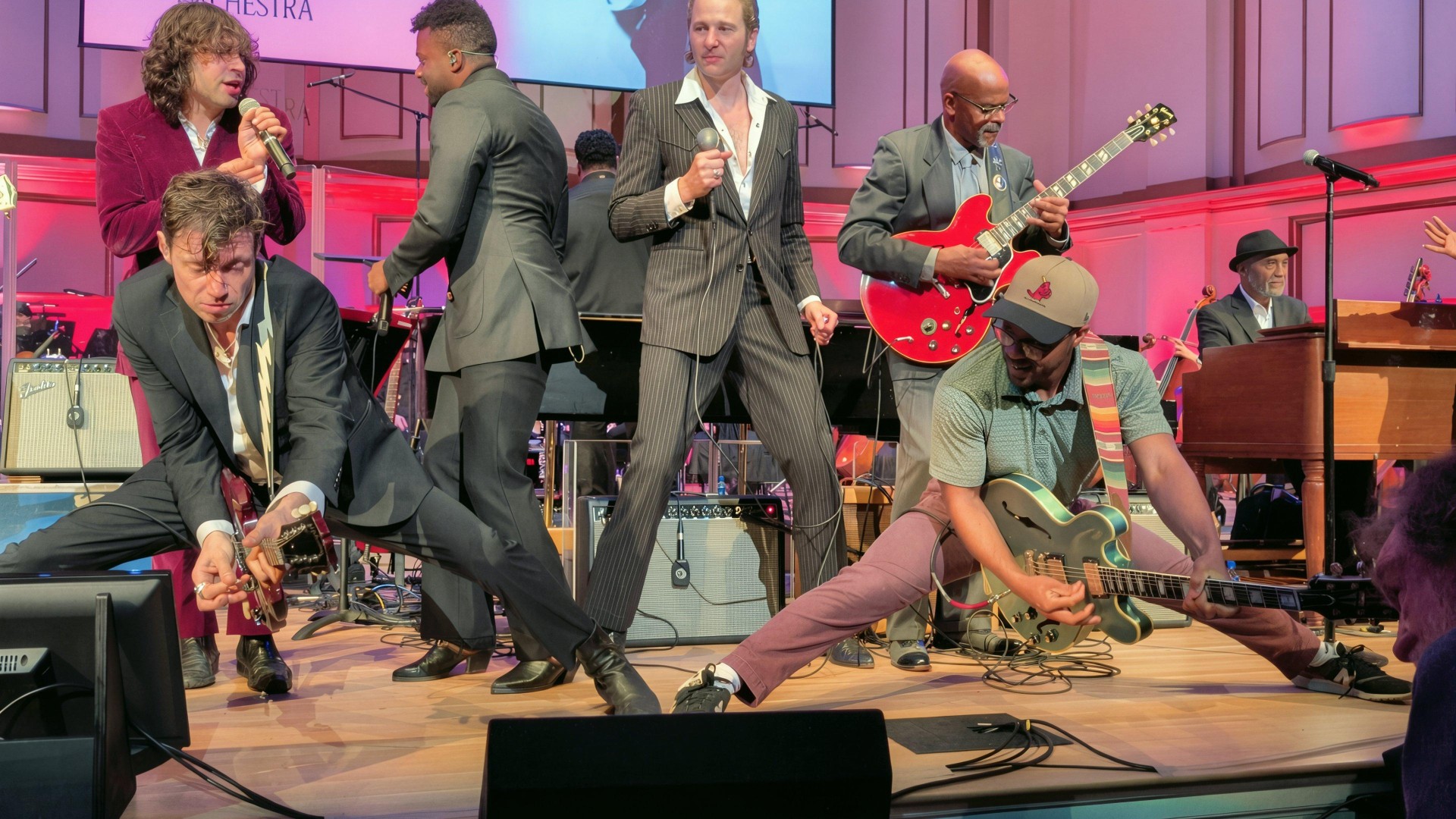 Charlie Berry performing in a symphony hall